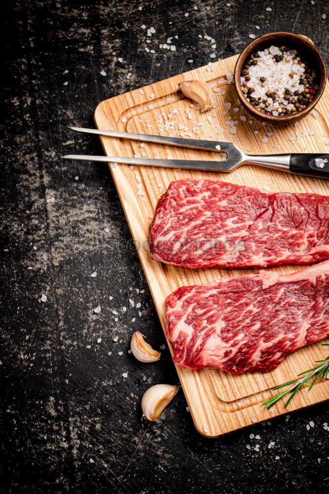 Similar – Image, Stock Photo Schnitzel meat on a rustic wooden table