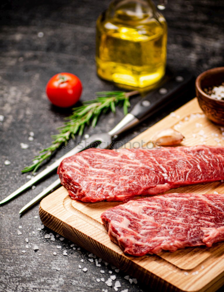 Similar – Image, Stock Photo Schnitzel meat on a rustic wooden table