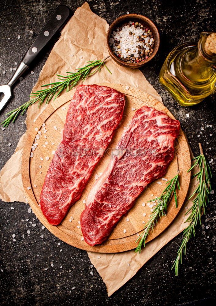 Similar – Image, Stock Photo Prepare steaks with herbs and butter