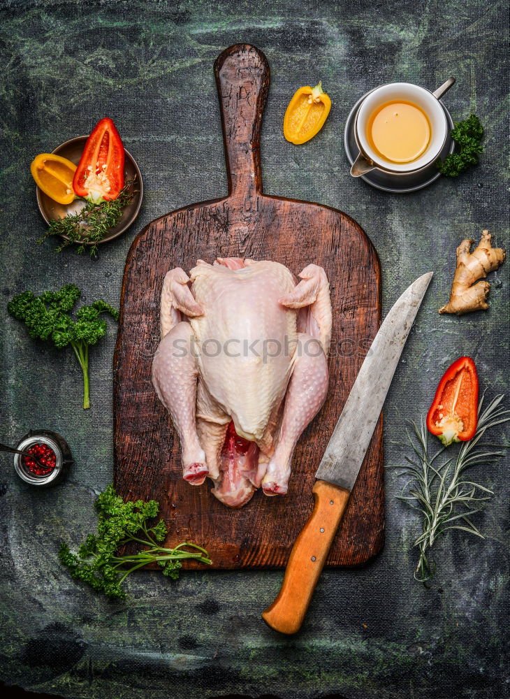 Similar – Image, Stock Photo Whole chicken with oil and vegetables Ingredients for tasty cuisine