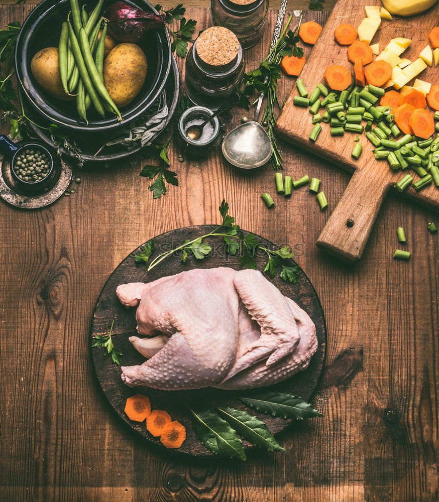 Similar – Whole chicken with cooking ingredients