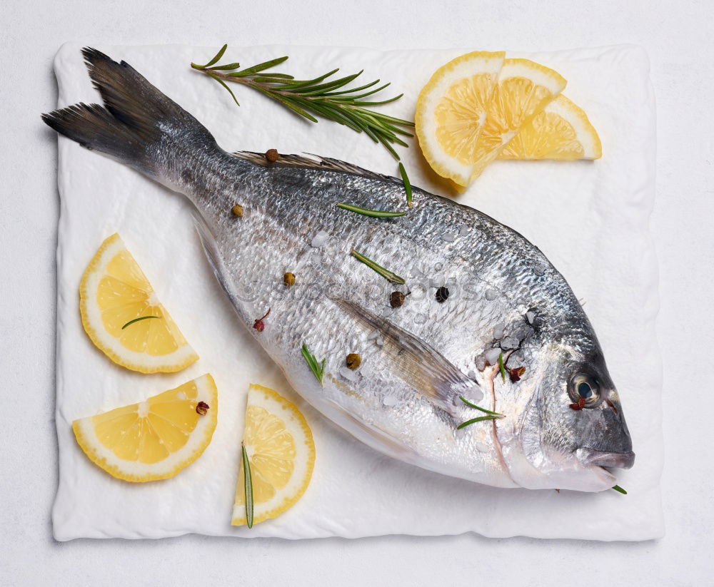 Similar – Dorado fish raw with spices