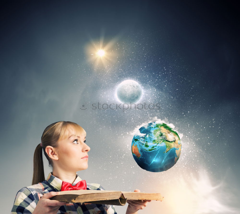 Similar – Pupil girl pointing at globe