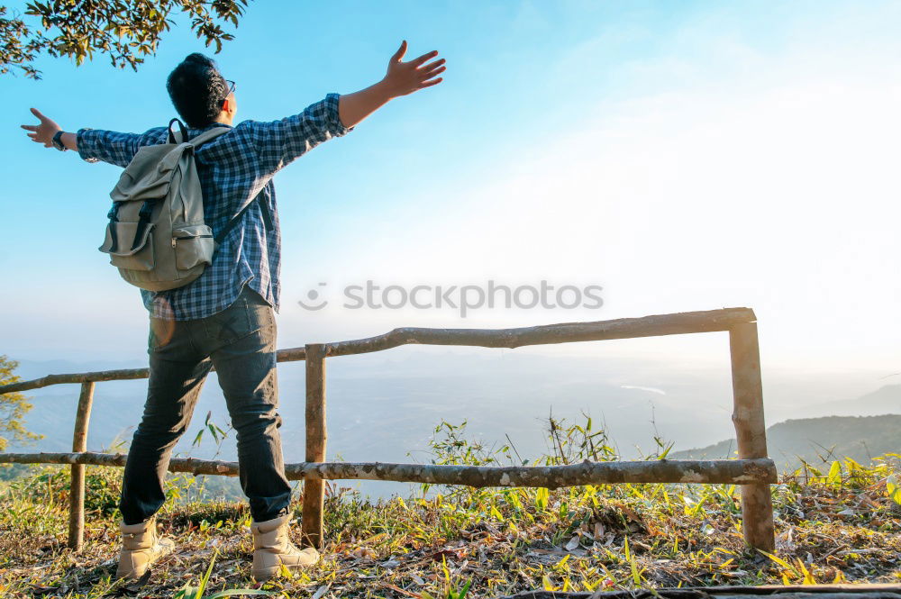 Similar – Image, Stock Photo Handsome tourist at mountain lake