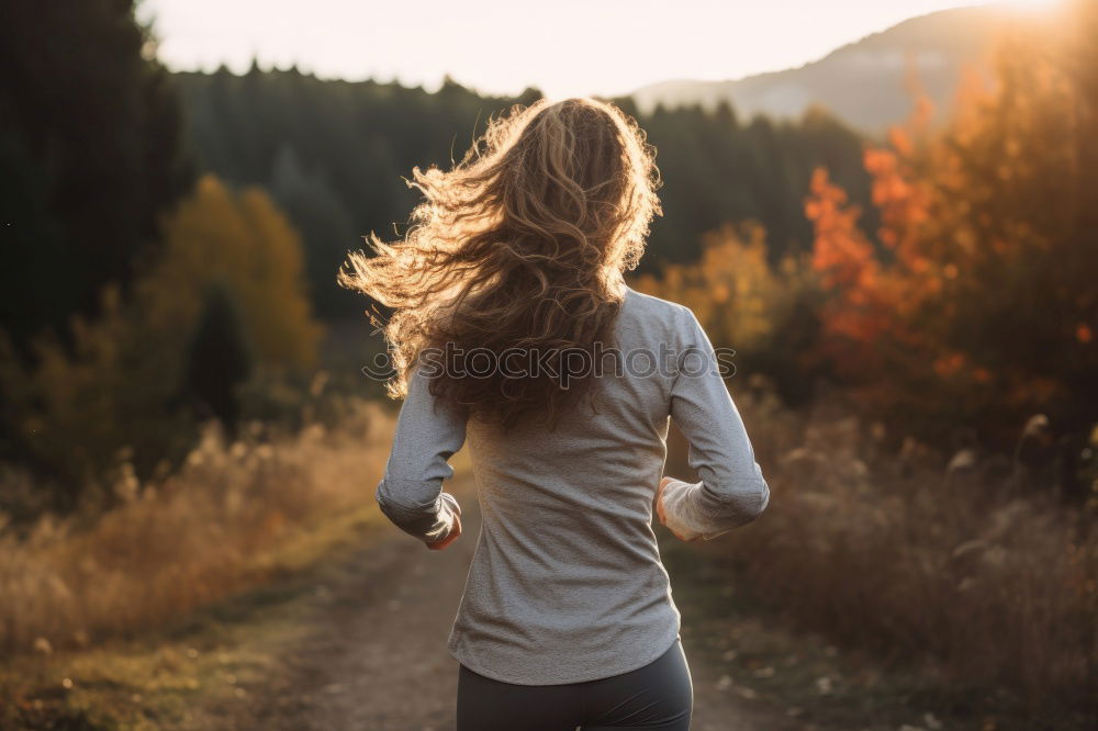 Similar – Image, Stock Photo Golden hour on long brown hair