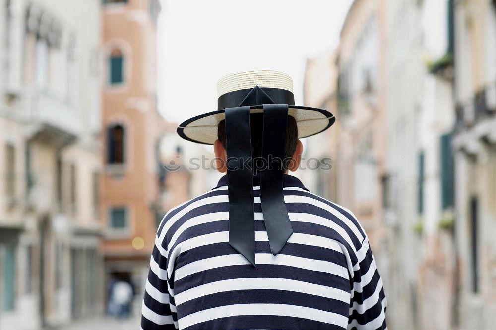 Similar – Man with backpack in the street