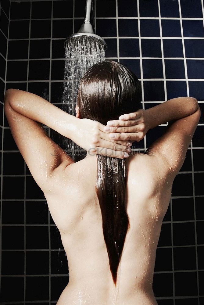 Similar – Woman using a peeling glove in a shower