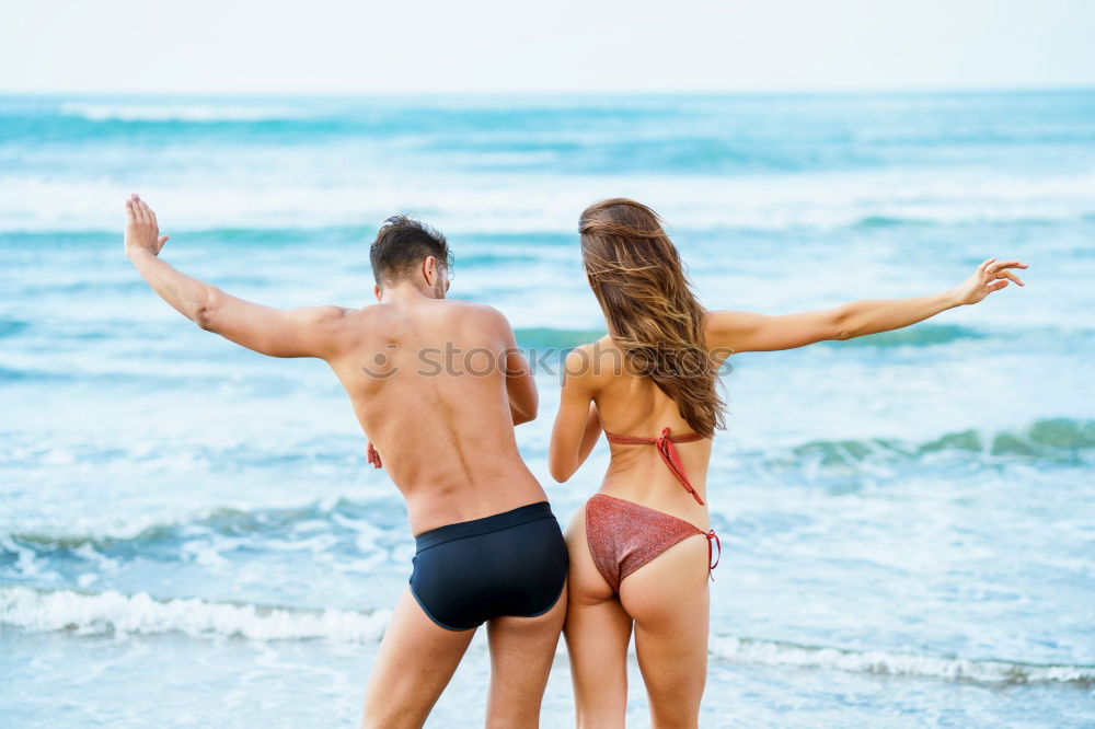 Image, Stock Photo Crop couple in swimsuit holding hands