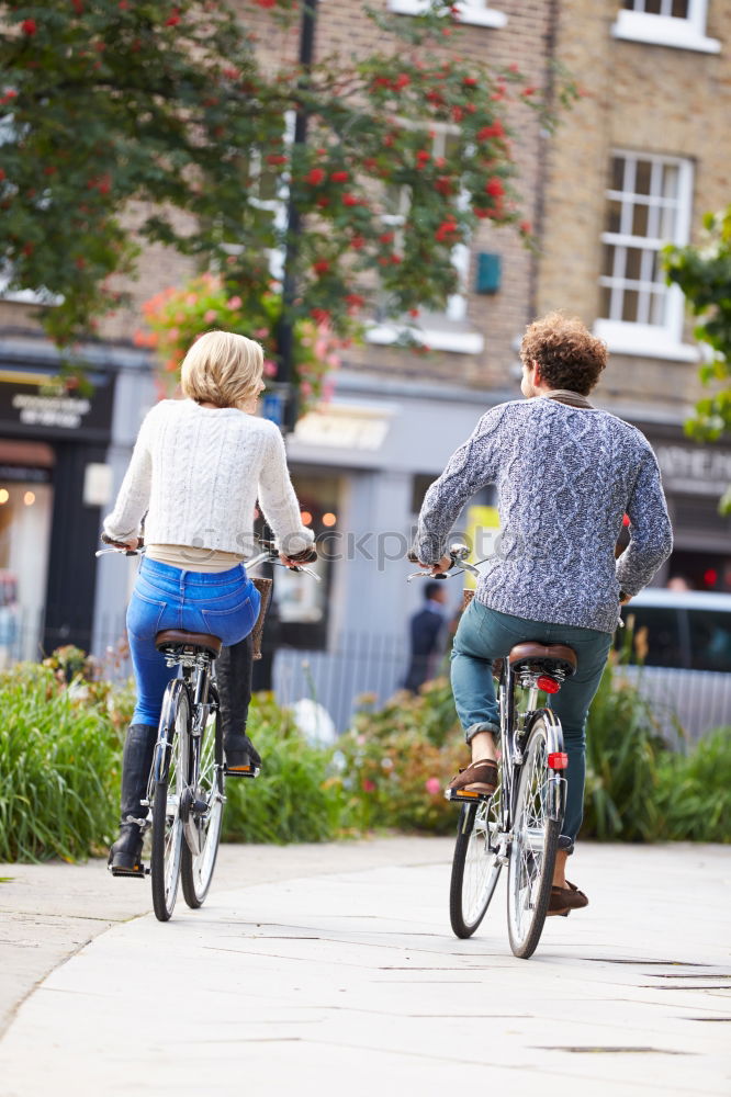 Similar – Image, Stock Photo Family with children riding bicycles in the nature
