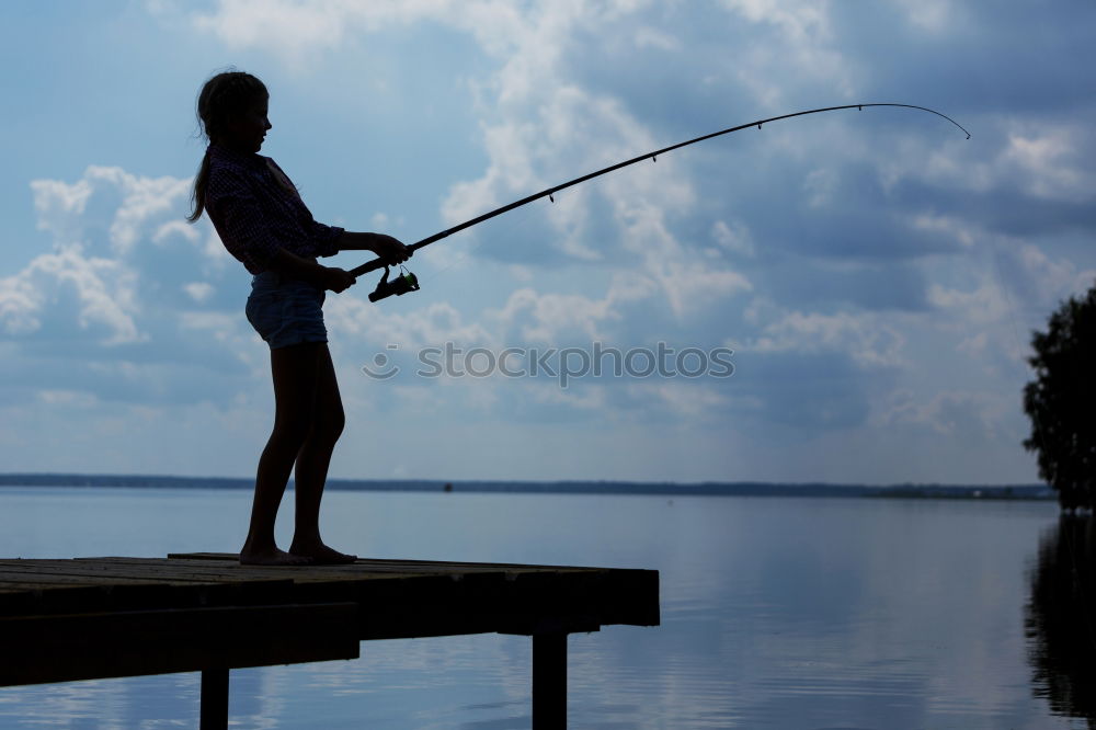 Similar – Man on fishing with rod