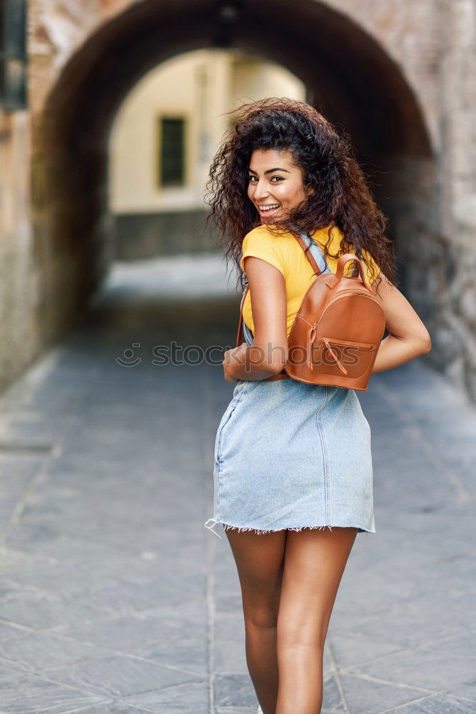 Similar – Image, Stock Photo Happy mixed woman with afro hair laughing outdoors.