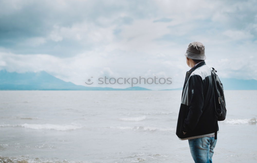 Similar – Woman posing at lake