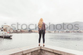 Similar – Young dreamy woman at seaside