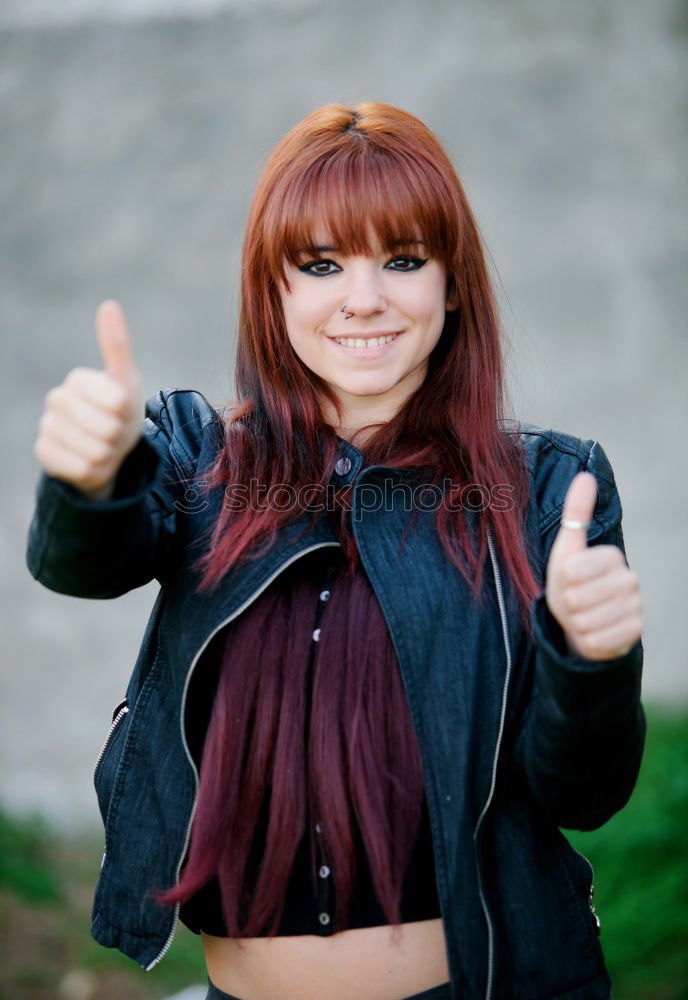 Similar – Redhead woman with blue shirt in a beautiful park