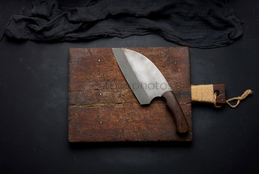 Similar – old brown wooden cutting board