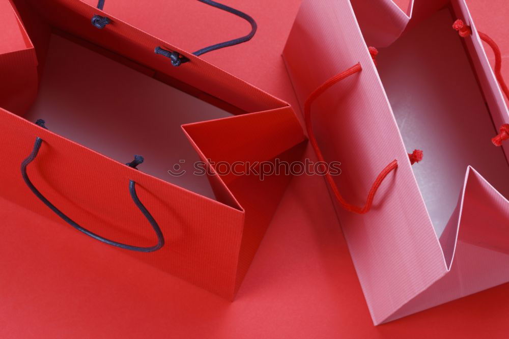 Similar – Paper bag full of black and red gifts