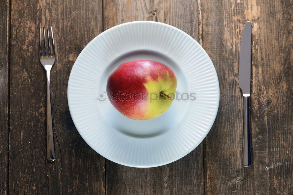 Similar – Image, Stock Photo Cutting apple on a green table. Diet food.