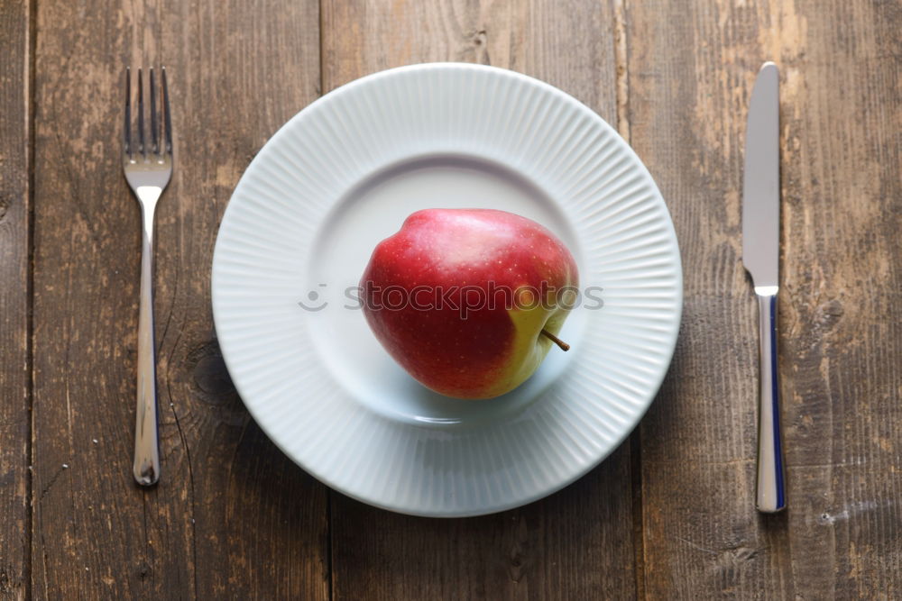 Similar – Image, Stock Photo Cutting apple on a green table. Diet food.