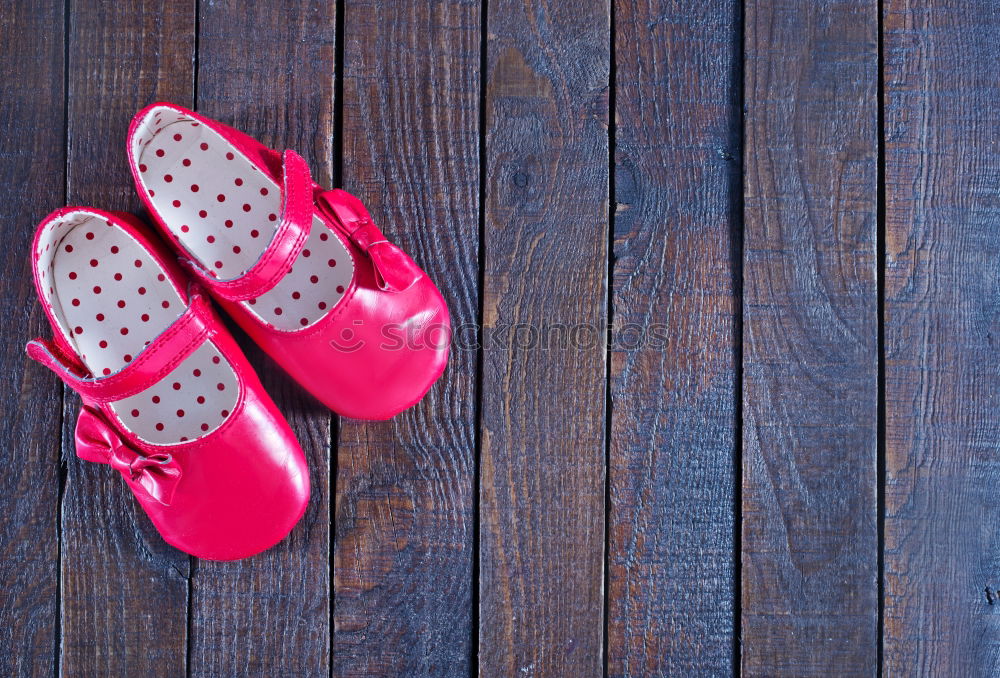 Similar – Image, Stock Photo Red shoes and red boxing gloves hanging on a rope