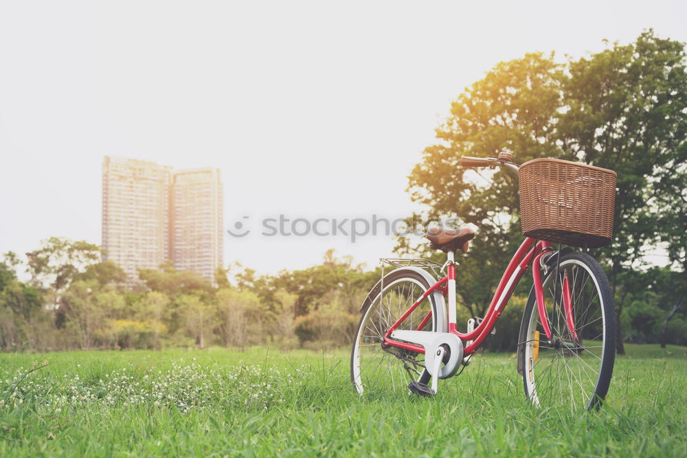 Similar – Young man on bike in the city