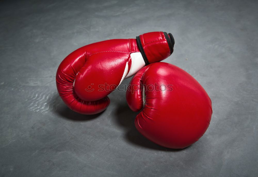 Similar – Image, Stock Photo red leather boxing gloves and a black textile bandage