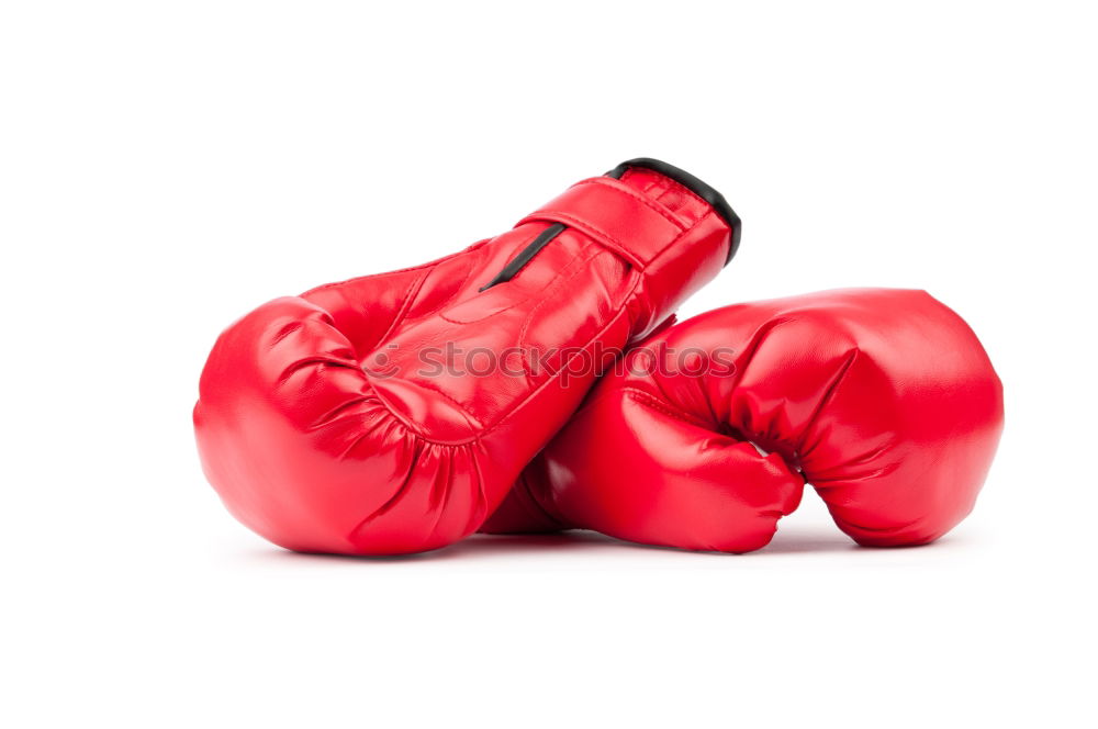 Similar – Image, Stock Photo hand is wearing a red leather boxing glove on a green background