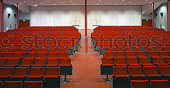 Similar – Theaterstuhl in roter Farbe im Konferenzraum.