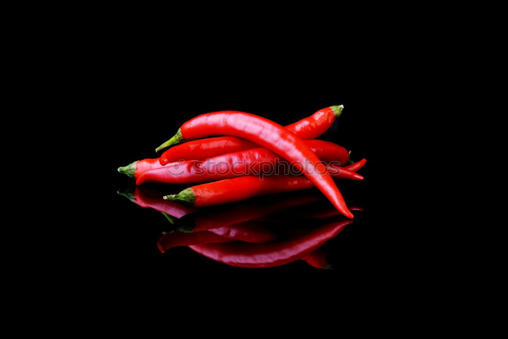 Similar – Image, Stock Photo Fresh red and spicy chilli peppers