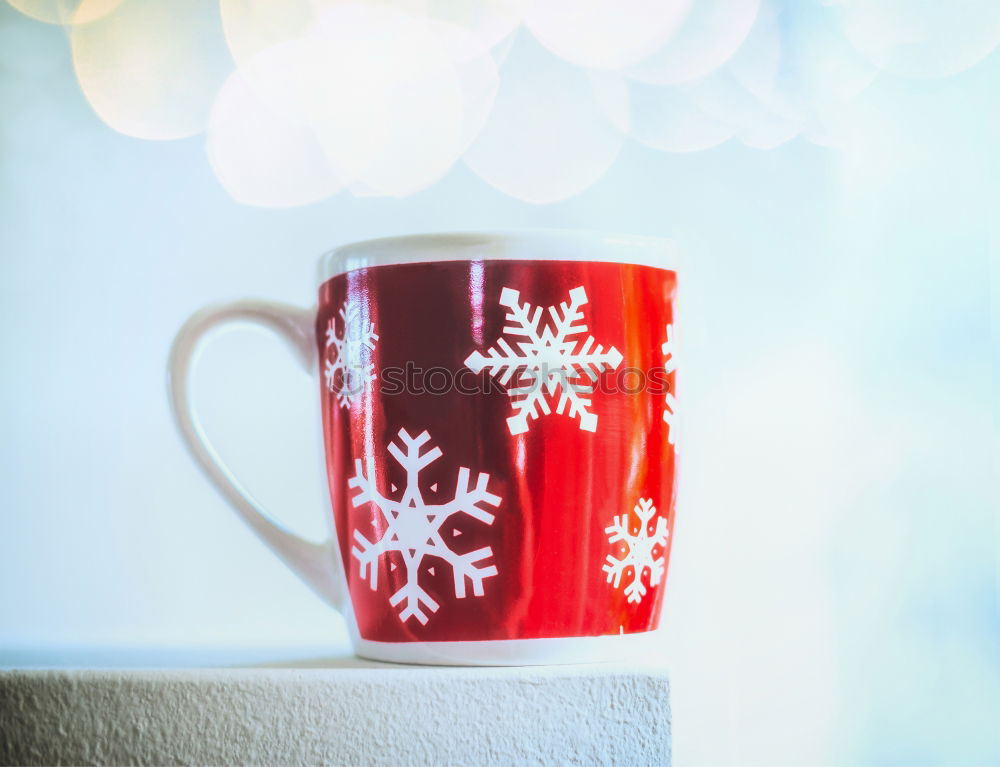 Similar – Christmas candy in the cup with snowflakes