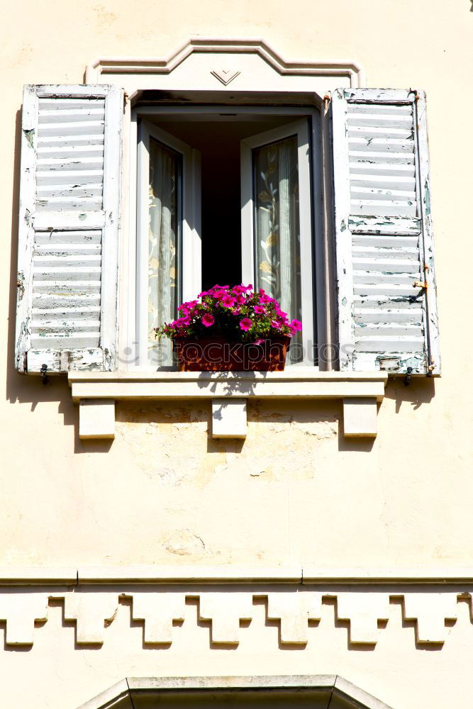 Similar – Window with shutters in red and white