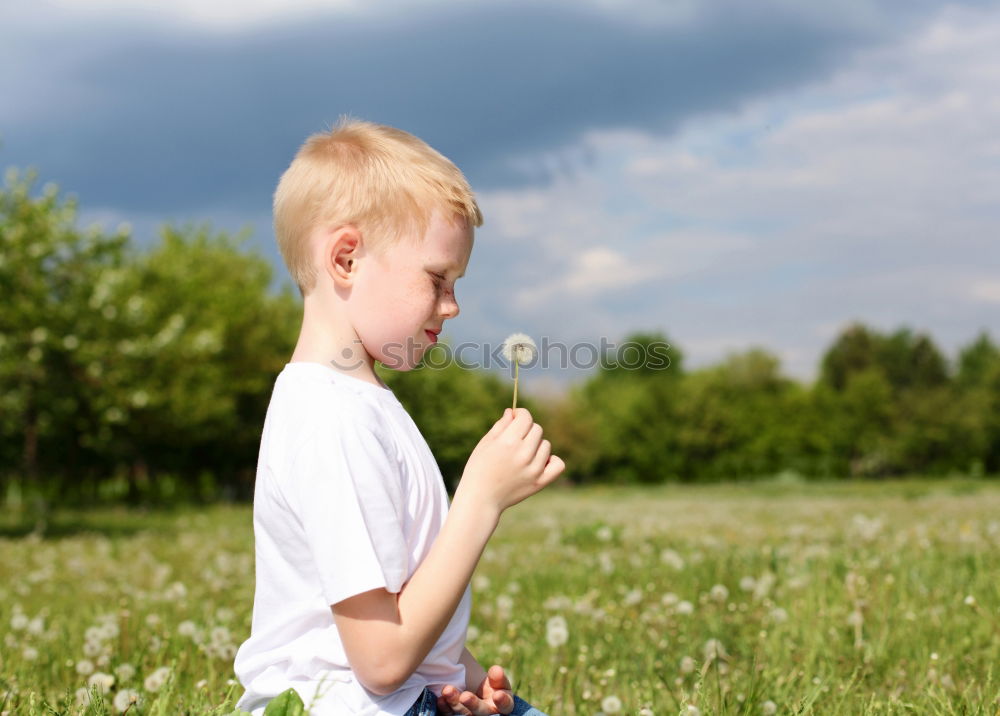 Similar – Image, Stock Photo thistle luck Child Girl