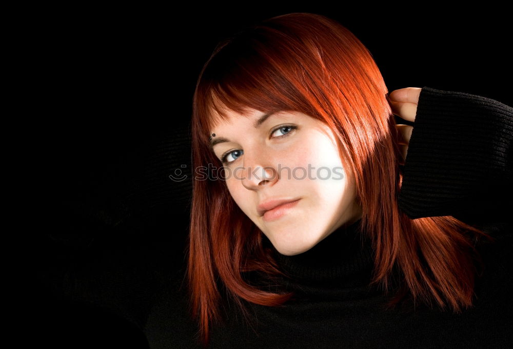 Similar – Portrait of a young woman in front of a neutral wall