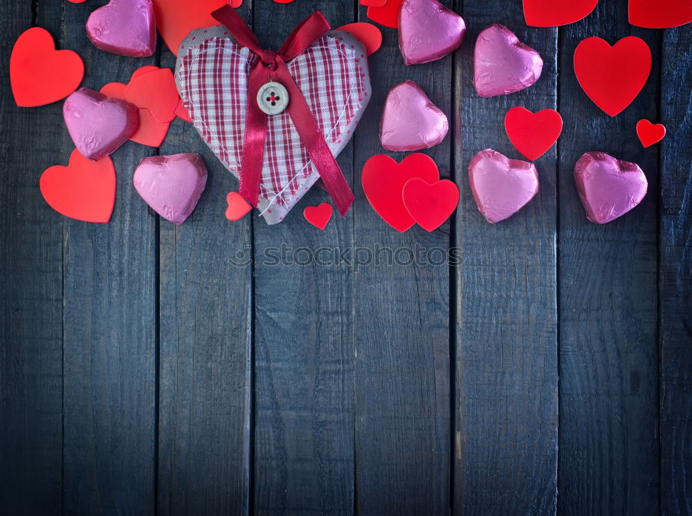 Similar – jeans and two red wooden hearts