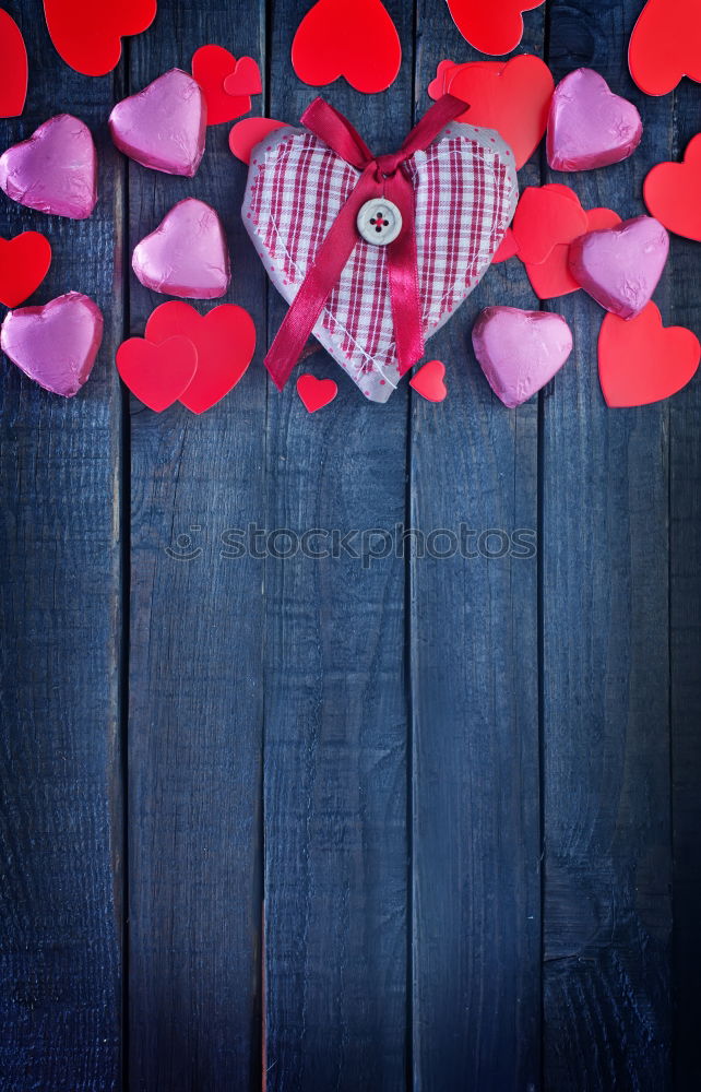 Similar – jeans and two red wooden hearts