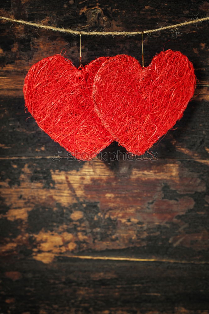 Similar – A red heart and LOVE are painted in gradient bright red color on a black wall / love