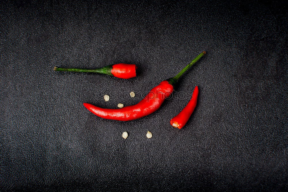 Similar – Image, Stock Photo Fresh red and spicy chilli peppers