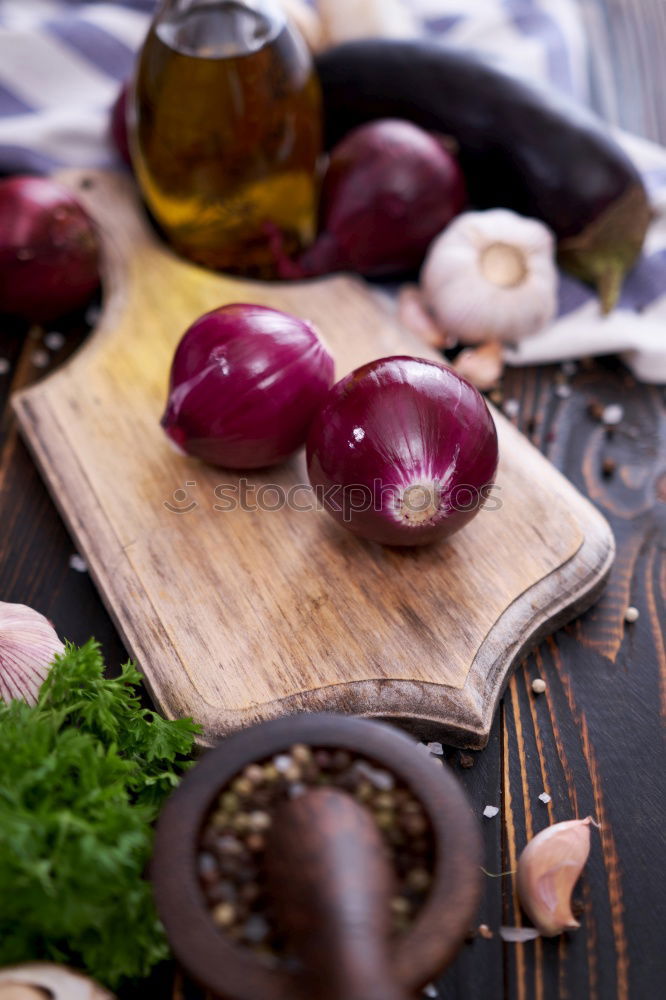 Similar – Red onion vegetable on the gray wooden surface