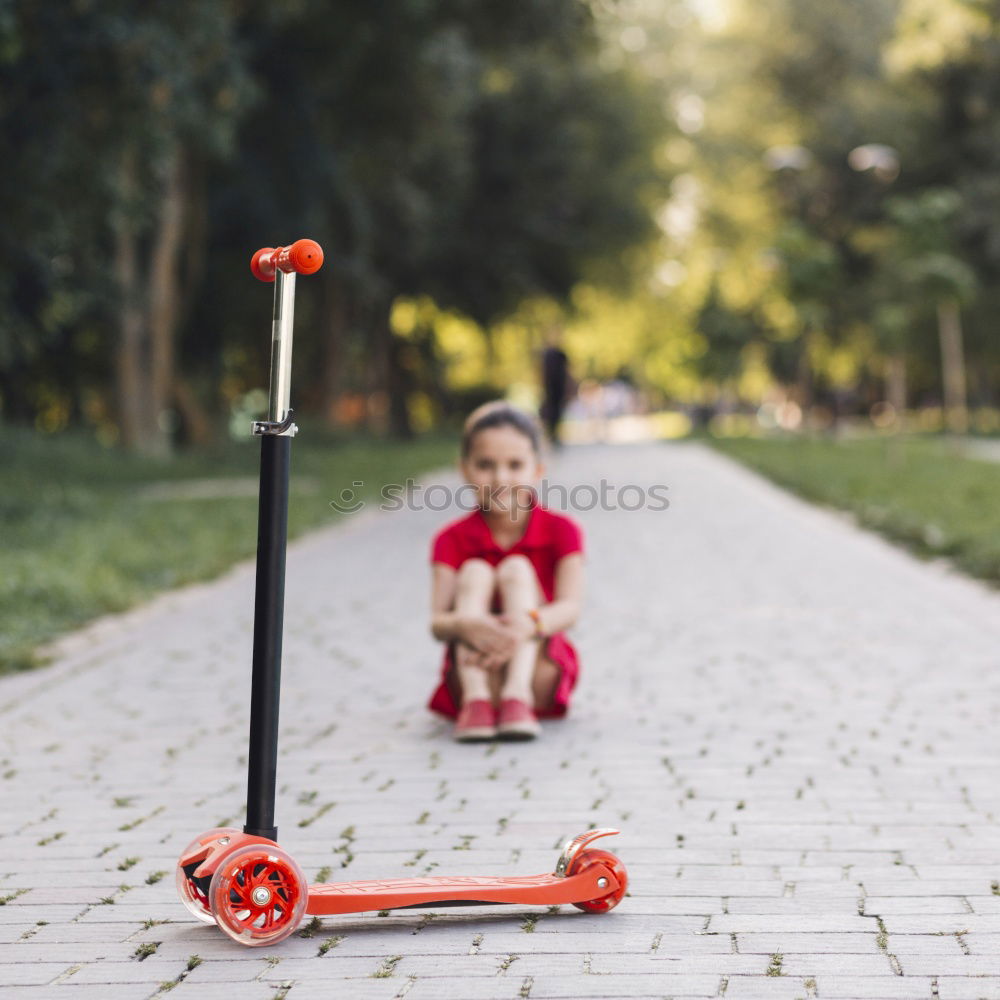 Similar – Five year old child with scooter in the park