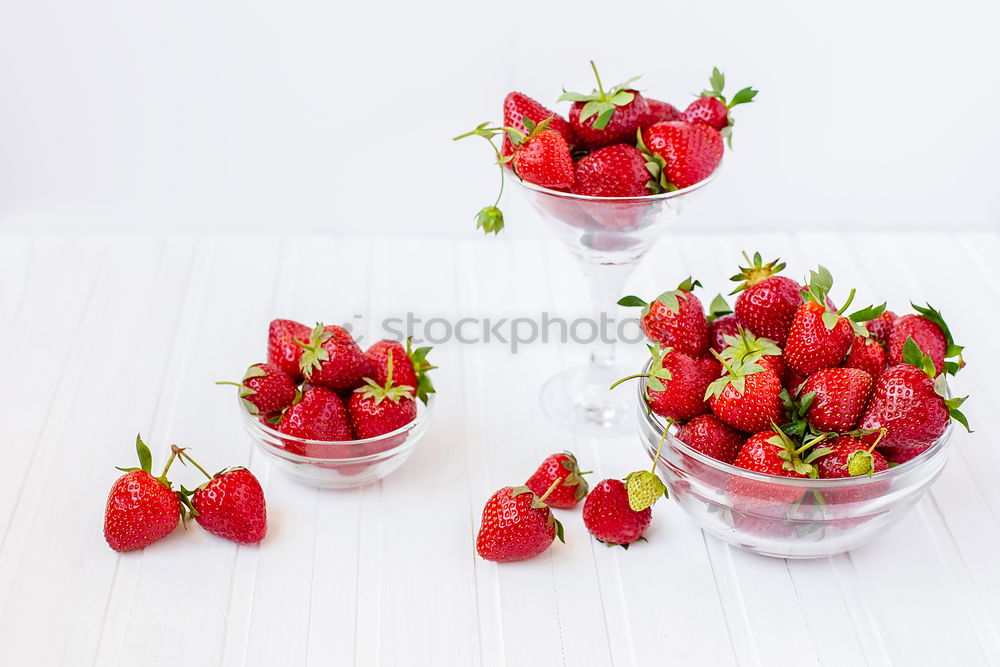 Similar – Strawberries in a bucket on a white wooden table