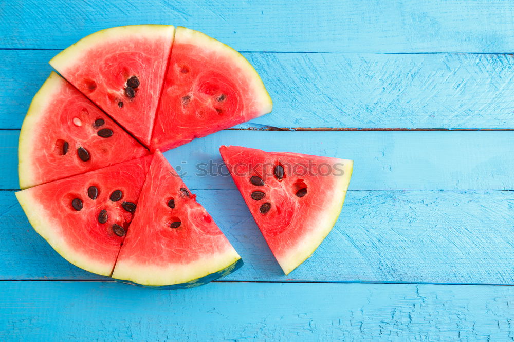 Similar – Pieces of watermelon on background painted in blue