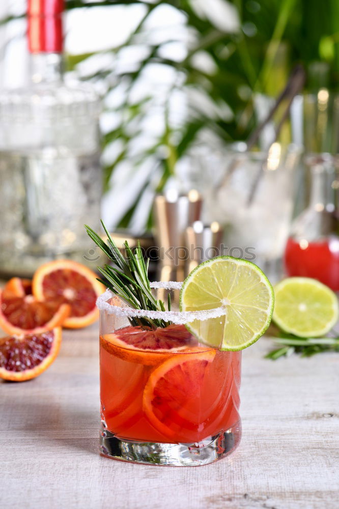 Similar – Two glasses of soft drink with honey- and watermelon, rosemary, ice cubes and drinking straw