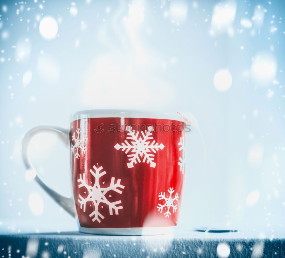 Christmas candy in the cup with snowflakes