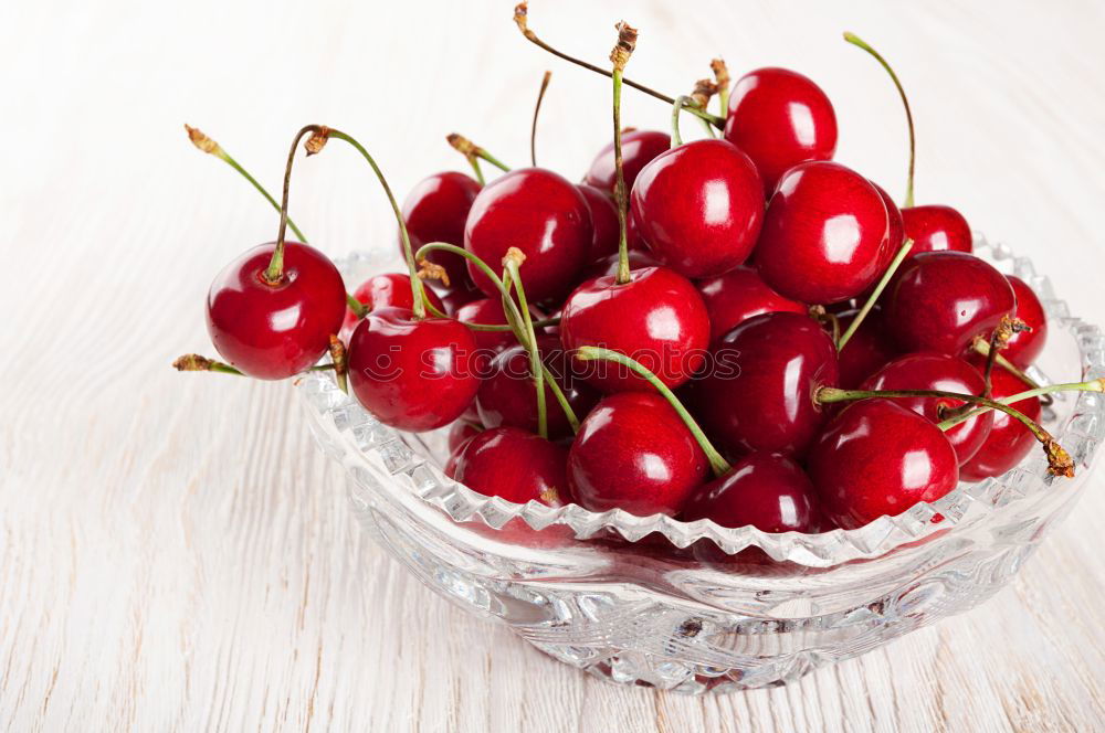 Similar – Image, Stock Photo Cup with fresh ripe cherries