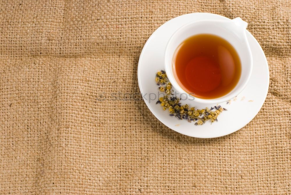 Similar – Image, Stock Photo Two woman hands holding empty finished cup of black tea