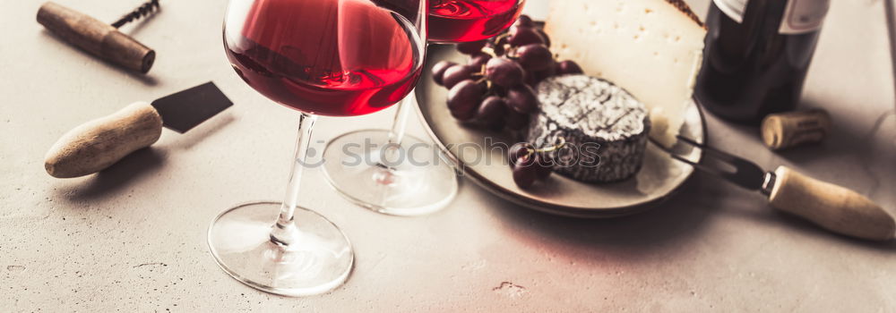 Similar – Glasses of red wine with candles