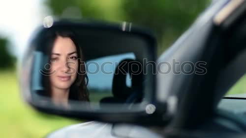 Similar – Image, Stock Photo Young woman in the frontseat of a car