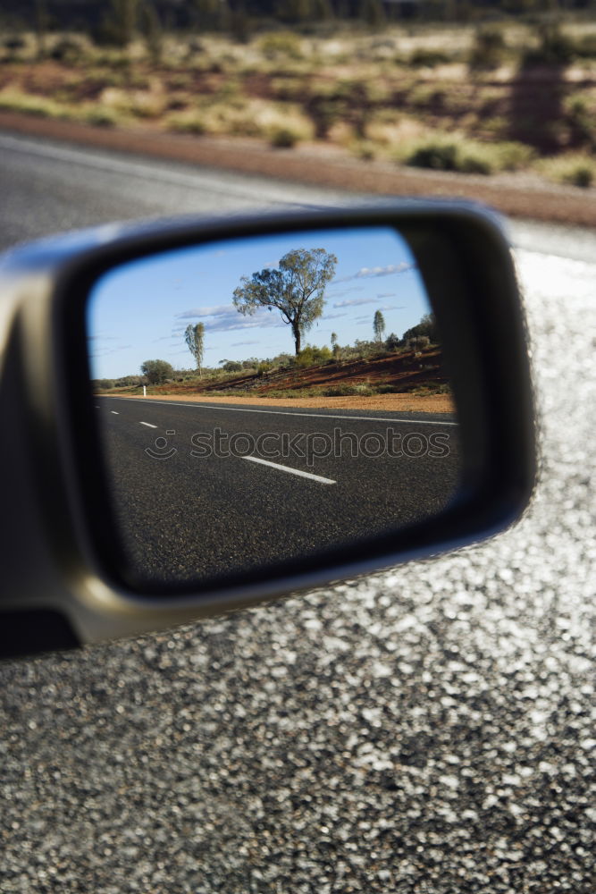Similar – Image, Stock Photo After the bend, straight ahead…road in the Outback Northern Territory. Australia which runs endlessly straight.