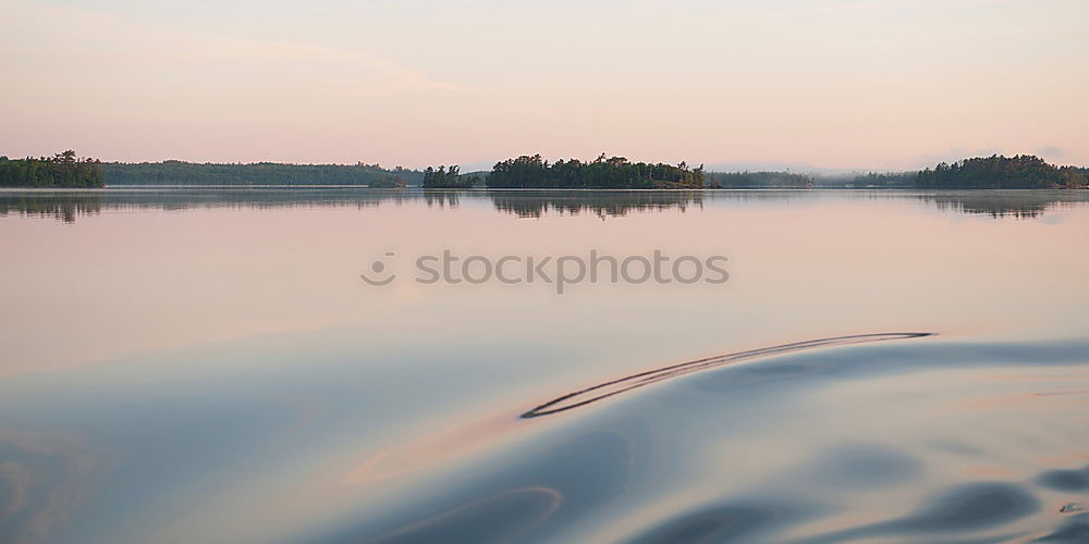 Similar – Image, Stock Photo Open, thawed ice surface on a lake. Climate, climate change