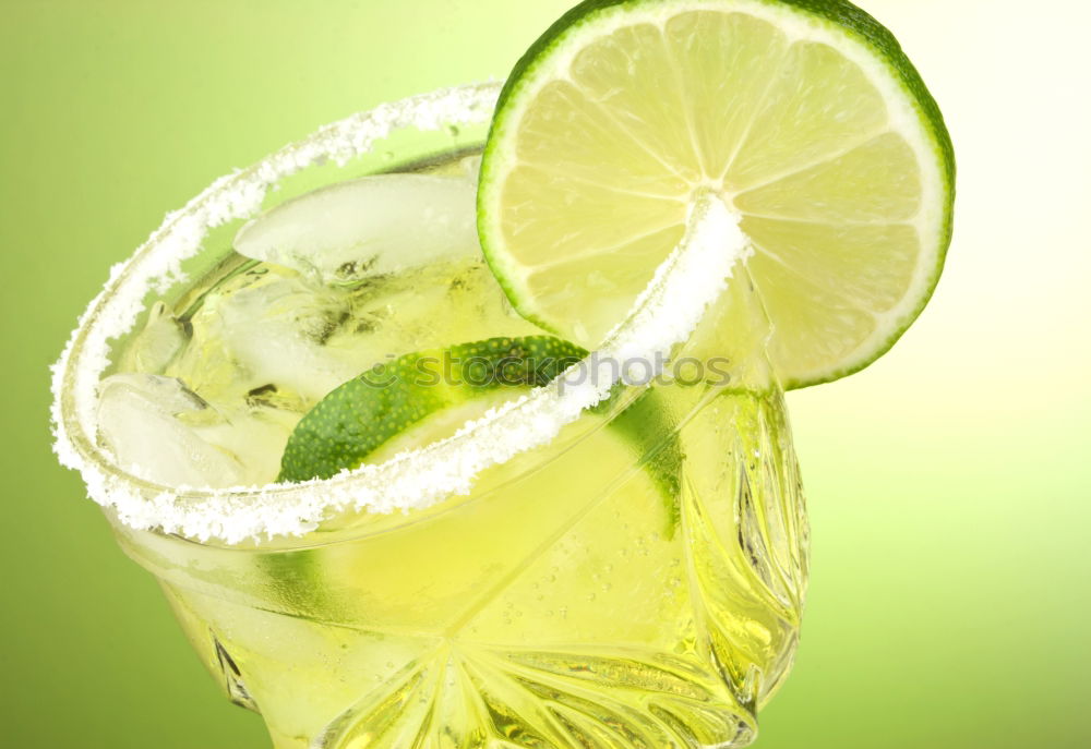 Similar – Mojito cocktail in glass on yellow background