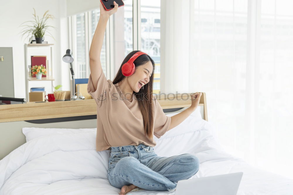 Similar – happy sleepy kid girl stretching in her room